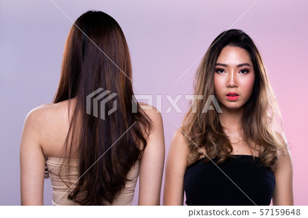 Fashion Asian Woman Tan skin black hair beautiful 57159648