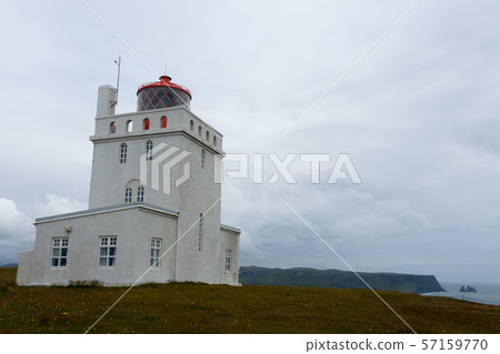 Dyrholaey lighthouse view. South Iceland landmark. 57159770