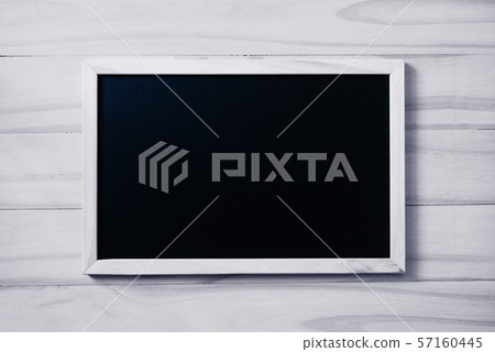 Blank  blackboard on white wood background 57160445