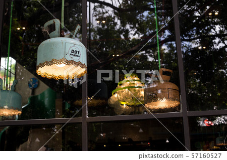 The lamp is made from an air tank. The lamp is made from an air tank. 57160527