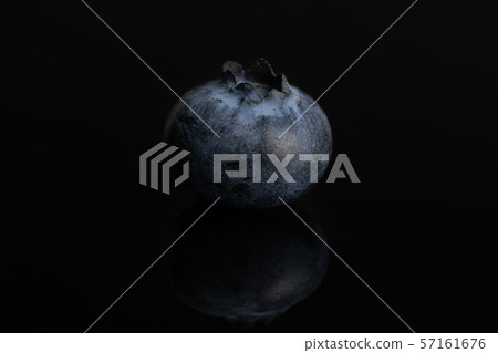 Fresj blue bilberry isolated on black glass Fresj blue bilberry isolated on black glass 57161676