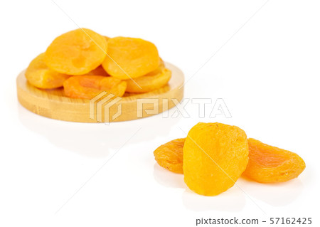 Dried orange apricot isolated on white Dried orange apricot isolated on white 57162425