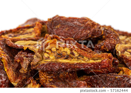 Red dried tomato isolated on white Red dried tomato isolated on white 57162444