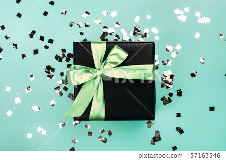 Black gift box with mint bow 57163546