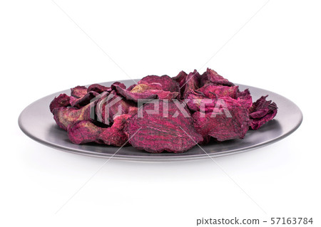 Dried red beetroot isolated on white Dried red beetroot isolated on white 57163784