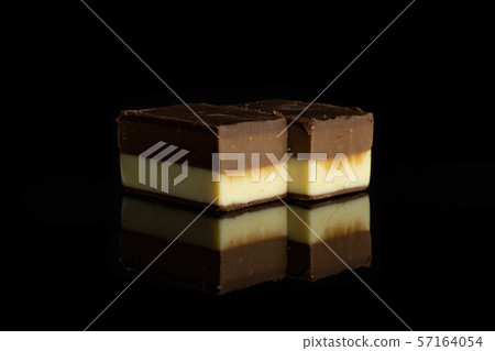 Two colours nougat isolated on black glass 57164054