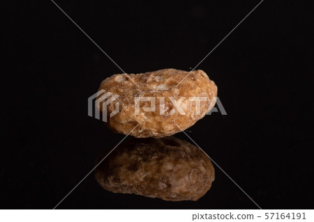 Choco balls cereal isolated on black glass Choco balls cereal isolated on black glass 57164191