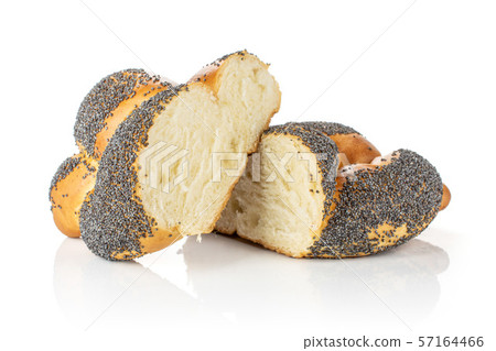 Twisted poppy seed bun isolated on white 57164466
