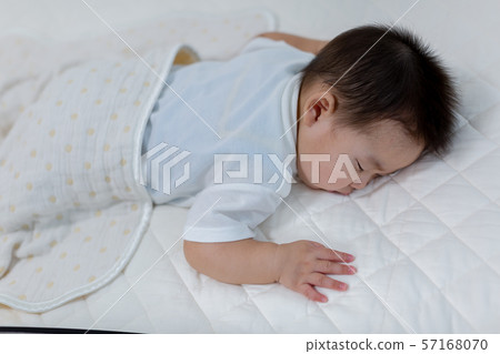 Baby's sleeping face 57168070
