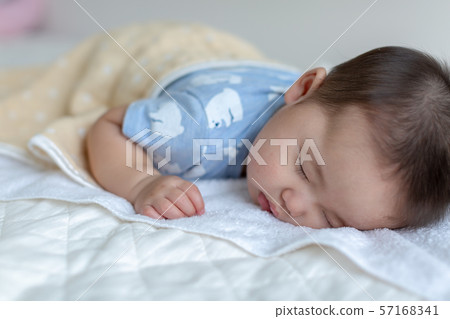 Baby's sleeping face 57168341