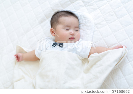 Baby's sleeping face Baby's sleeping face 57168662