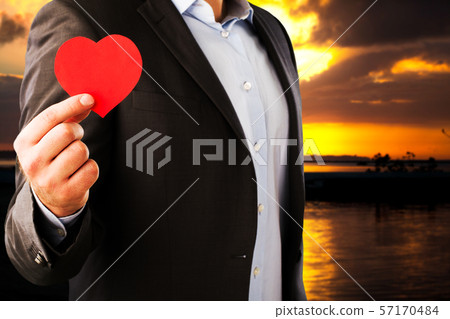 Businessman in a classic suit with an red heart on 57170484