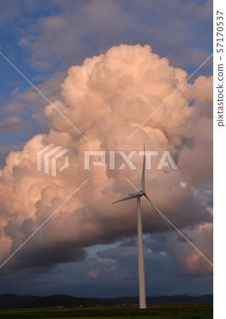 Photographing the landscape of cumulonimbus clouds and wind turbines at sunset in Esashi, Hokkaido 57170537