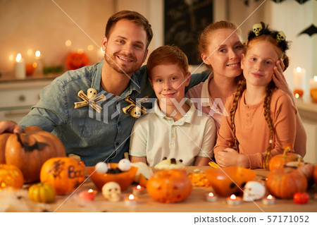 Happy family celebrating holiday Happy family celebrating holiday 57171052