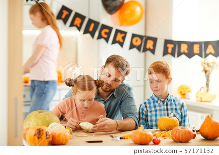 Family preparing for the Halloween holiday 57171132