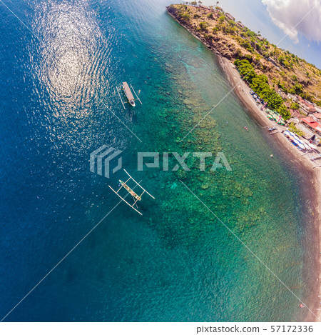 Jemeluk Bay, Amed. Amed is fast becoming a popular tourist destination in Bali, Indonesia. Set in 57172336