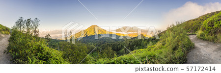 The magnificent views on green mountains from a mountain road trecking to the Ijen volcano or Kawah The magnificent views on green mountains from a mountain road trecking to the Ijen volcano or Kawah 57172414