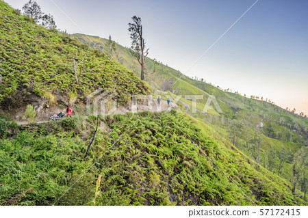 The magnificent views on green mountains from a mountain road trecking to the Ijen volcano or Kawah The magnificent views on green mountains from a mountain road trecking to the Ijen volcano or Kawah 57172415