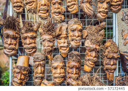 Typical souvenir shop selling souvenirs and handicrafts of Bali at the famous Ubud Market, Indonesia Typical souvenir shop selling souvenirs and handicrafts of Bali at the famous Ubud Market, Indonesia 57172445