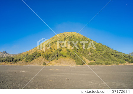 the Batok volcano in the Bromo Tengger Semeru National Park on the Java Island, Indonesia. One of the Batok volcano in the Bromo Tengger Semeru National Park on the Java Island, Indonesia. One of 57172624
