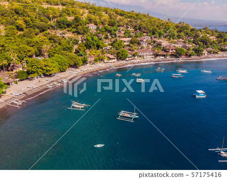 Jemeluk Bay, Amed. Amed is fast becoming a popular tourist destination in Bali, Indonesia. Set in 57175416