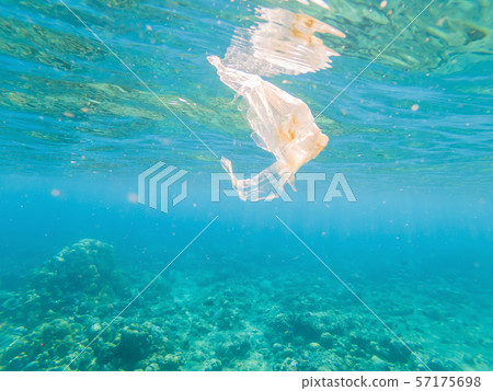 Plastic ocean. Pollution crisis as plastic bags, cups, straws and bottles end up in sea Plastic ocean. Pollution crisis as plastic bags, cups, straws and bottles end up in sea 57175698