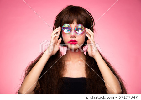 Fashion Model Woman wear Kaleidoscope Glasses 57177347