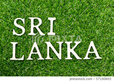 Wood alphabet letter in word Sri Lanka on green grass Wood alphabet letter in word Sri Lanka on green grass 57180603