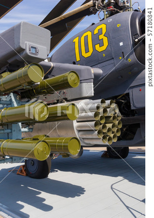 Outdoors exhibition of airplanes - A helicopter in full armor and ammunition Outdoors exhibition of airplanes - A helicopter in full armor and ammunition 57180841
