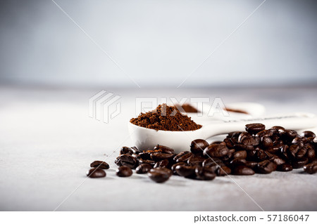 Coffee beans on gray background 57186047