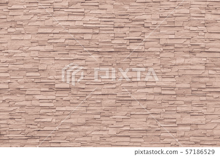 Rock stone brick tile wall aged texture detailed pattern background in cream red brown color 57186529