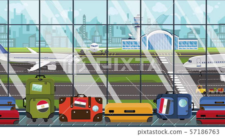 Suitcases with Egyptian flag stickers on baggage carousel in airport. Travel to Egypt conceptual Suitcases with Egyptian flag stickers on baggage carousel in airport. Travel to Egypt conceptual 57186763