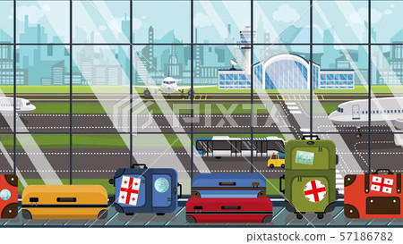 Suitcases with Georgian flag stickers on baggage carousel in airport. Tourism in Georgia conceptual 57186782