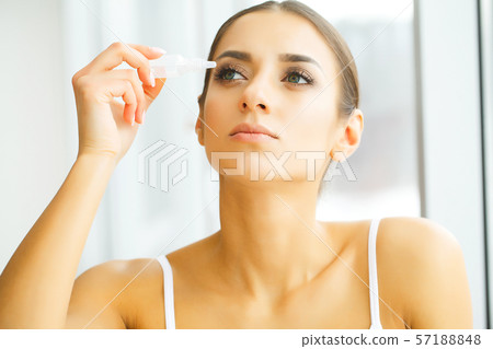 Young Beautiful Woman With Eyedrops. Vision And Medicine Concept 57188848