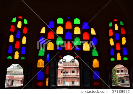 Inside of Jaipur, India-style palace, beautiful stained glass and view from room window, pink cityscape 57189955