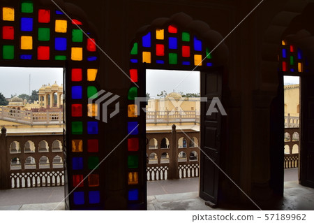 Indian Jaipur-style palace room with beautiful stained glass and door view 57189962
