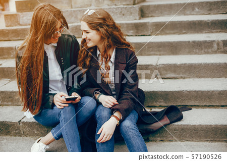 two stylish girl in a city 57190526