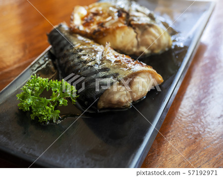 Japanese food style , grilled Saba fish in dish on wood table. 57192971