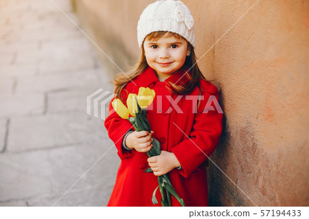 litlle girl with flowers 57194433