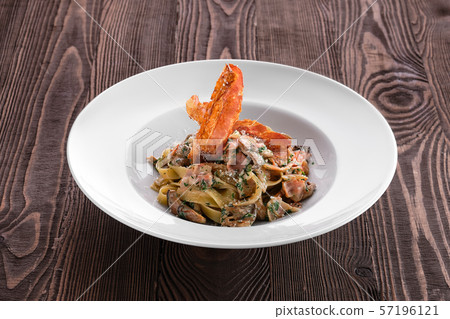 Pasta with chicken, oyster mushrooms and bacon Pasta with chicken, oyster mushrooms and bacon 57196121