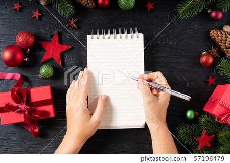 Christmas flat lay scene with golden decorations Christmas flat lay scene with golden decorations 57196479