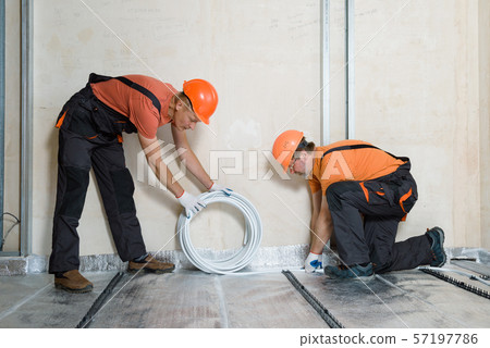 Installation of a warm floor. Installation of a warm floor. 57197786