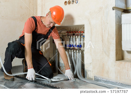 Installation of a warm floor. Installation of a warm floor. 57197787