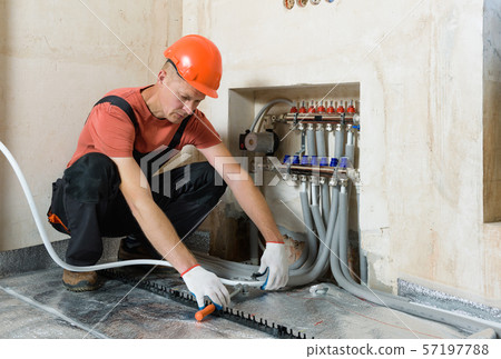 Installation of a warm floor. Installation of a warm floor. 57197788