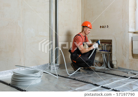 Installation of a warm floor. Installation of a warm floor. 57197790