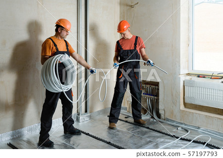 Installation of a warm floor. Installation of a warm floor. 57197793