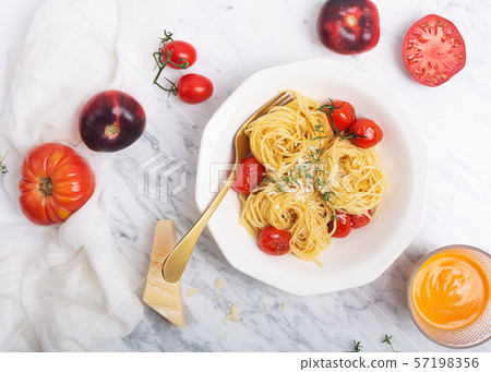 Italian pasta spaghetti with fried cherry tomato Italian pasta spaghetti with fried cherry tomato 57198356