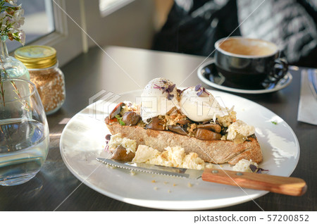 Breakfast with poached eggs and toast bread 57200852