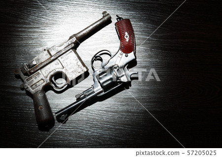 Old Revolver And Pistol 57205025