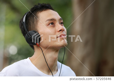 Men listening to music 57205646